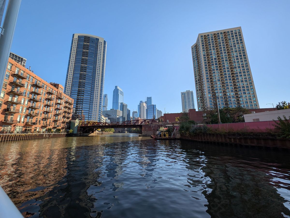 Brick lofts and a red truss bridge farther up the North Branch