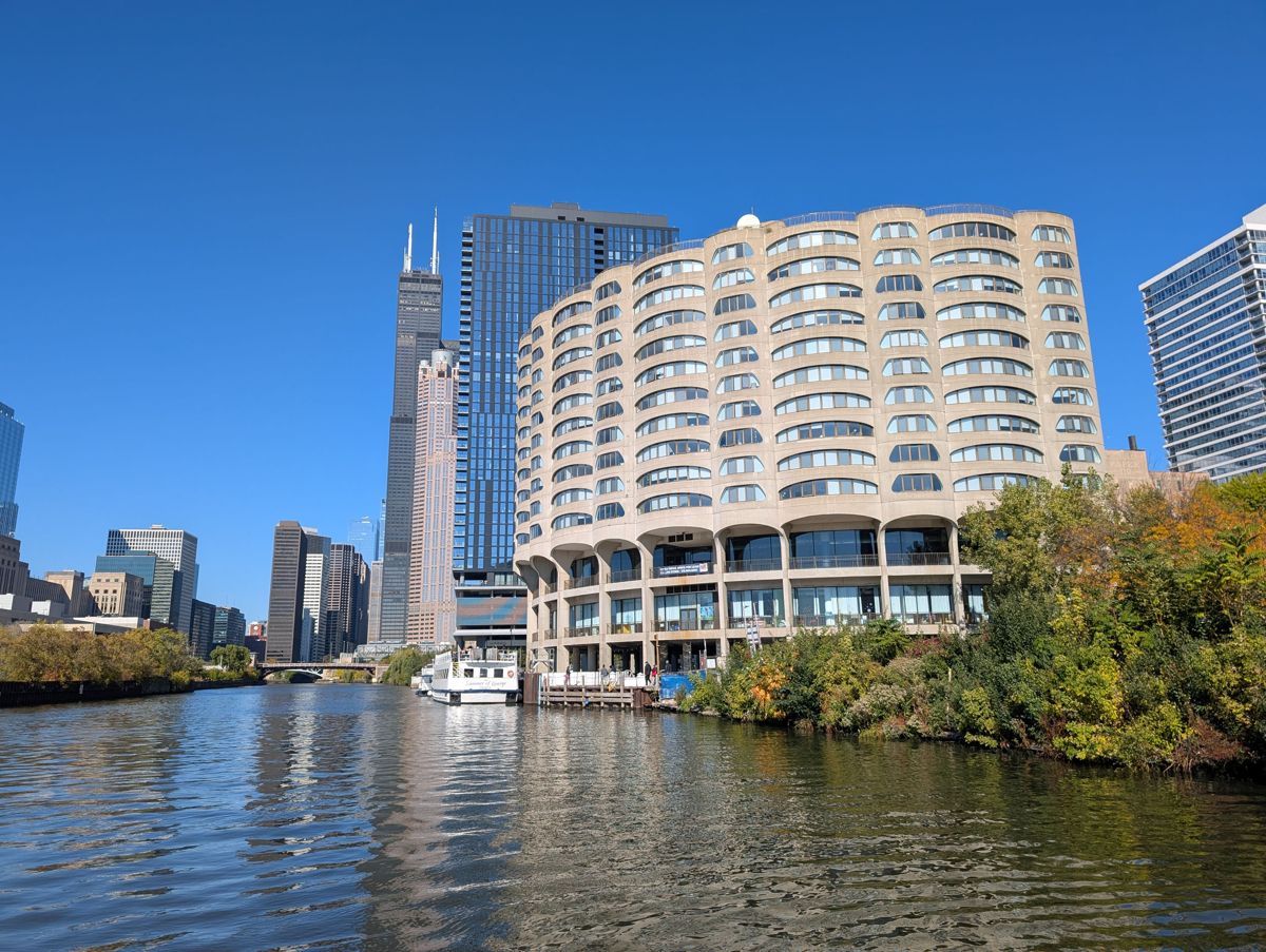 River City's curving concrete, by Marina City's architect, with Willis Tower behind