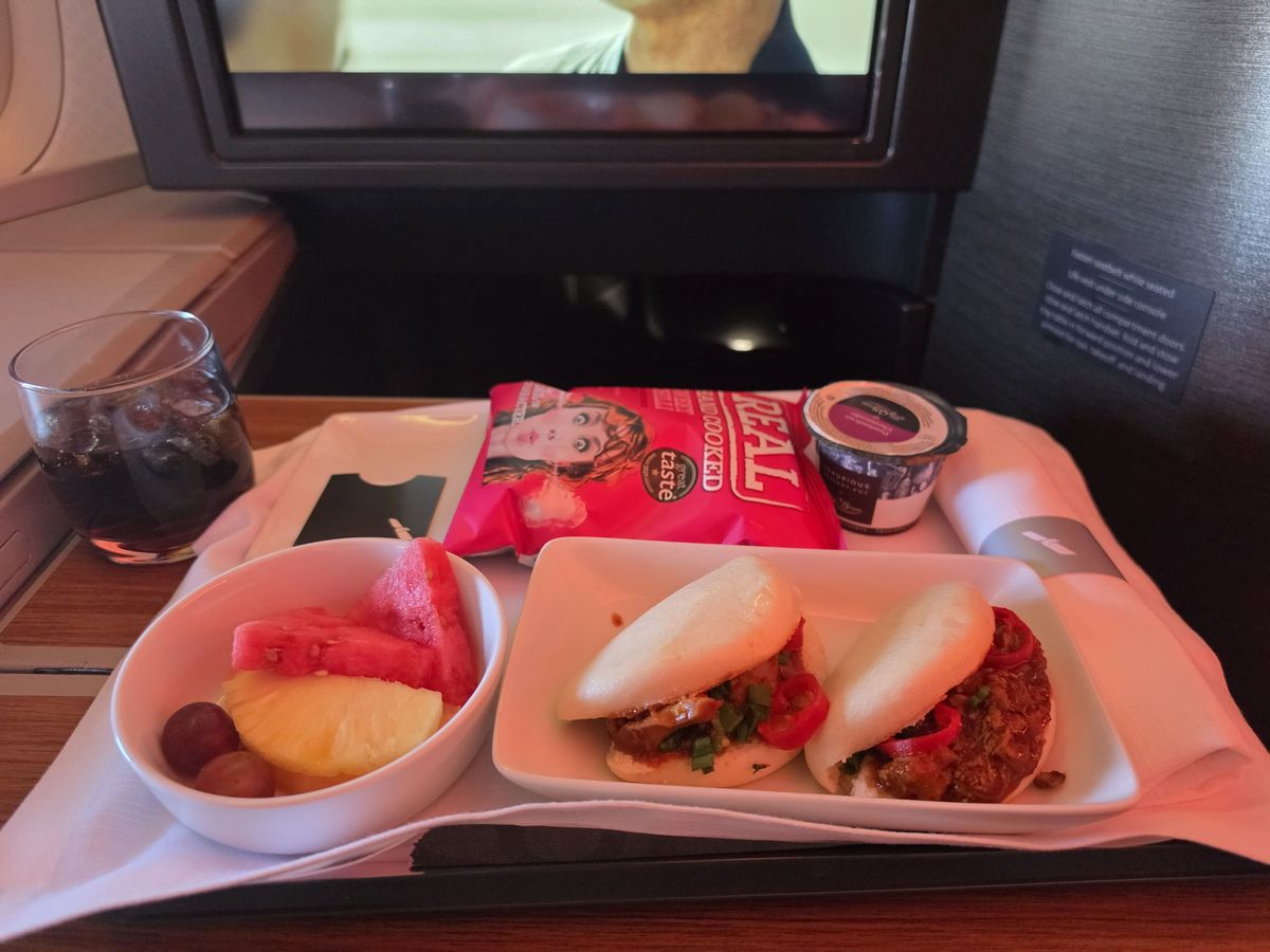 Bao buns, fruit and crisps before landing