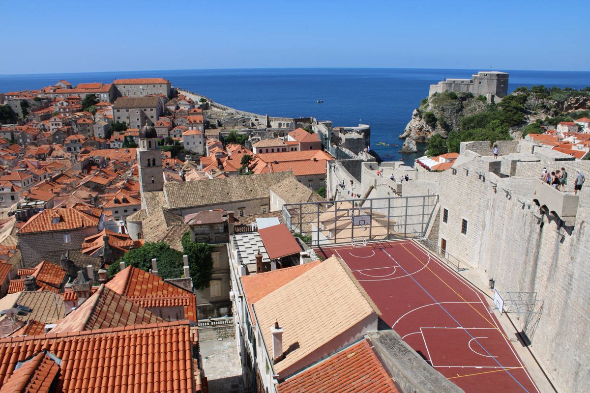 Red roofs and a court inside the walls