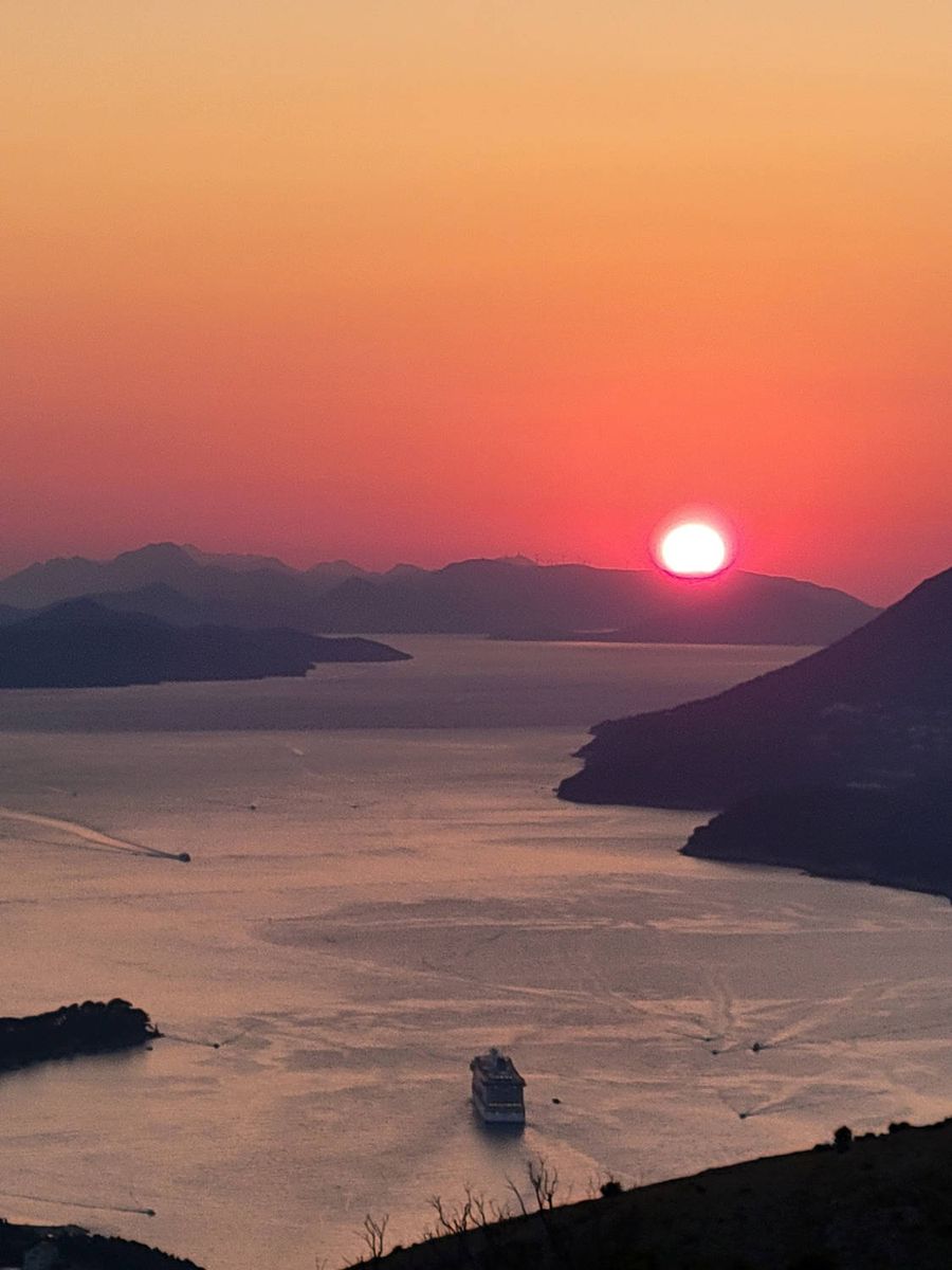 The sun meeting the hills