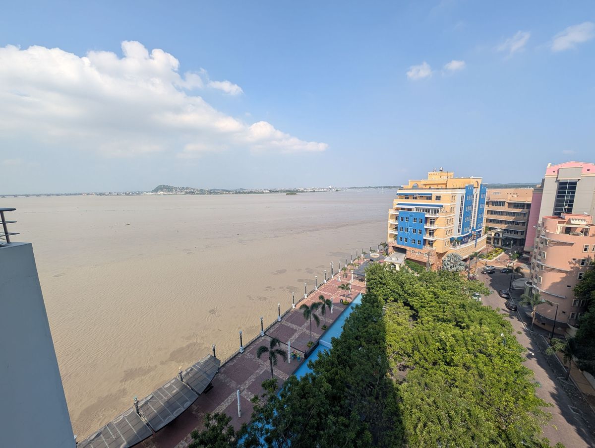From the balcony: the Guayas River and the riverfront promenade below