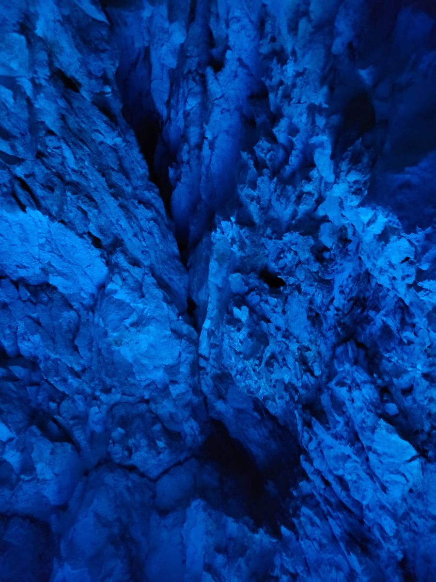 Rock lit blue from below