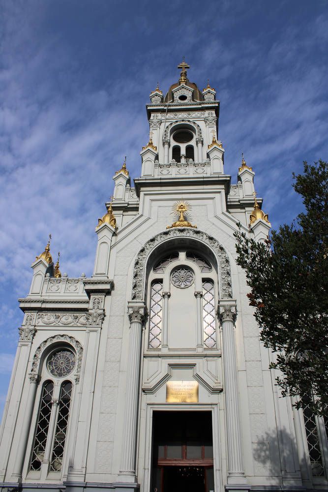 A white church with an ornate tower