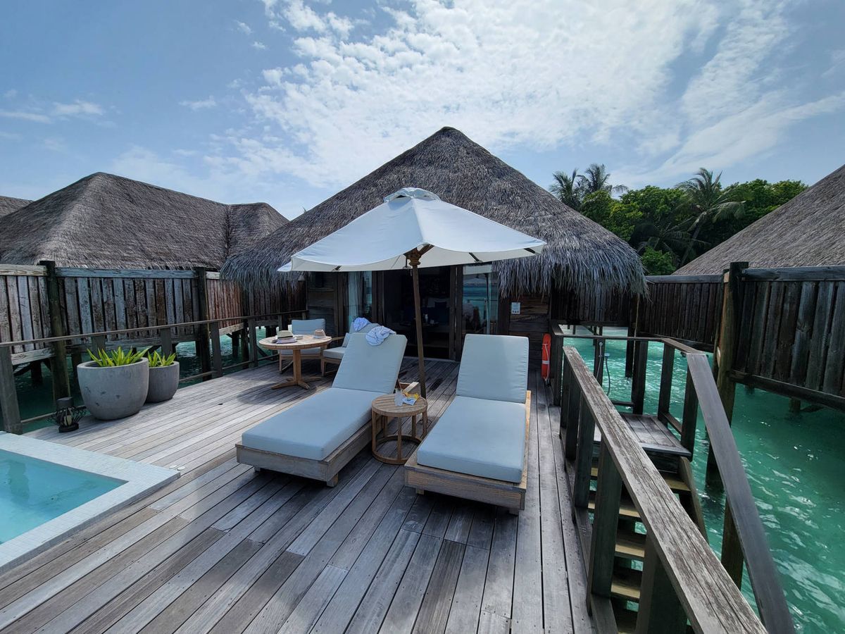 The deck and plunge pool under thatched roofs