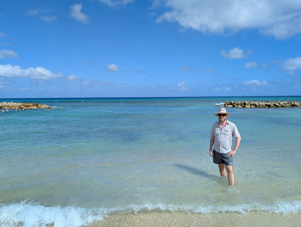 Brendan standing in the water
