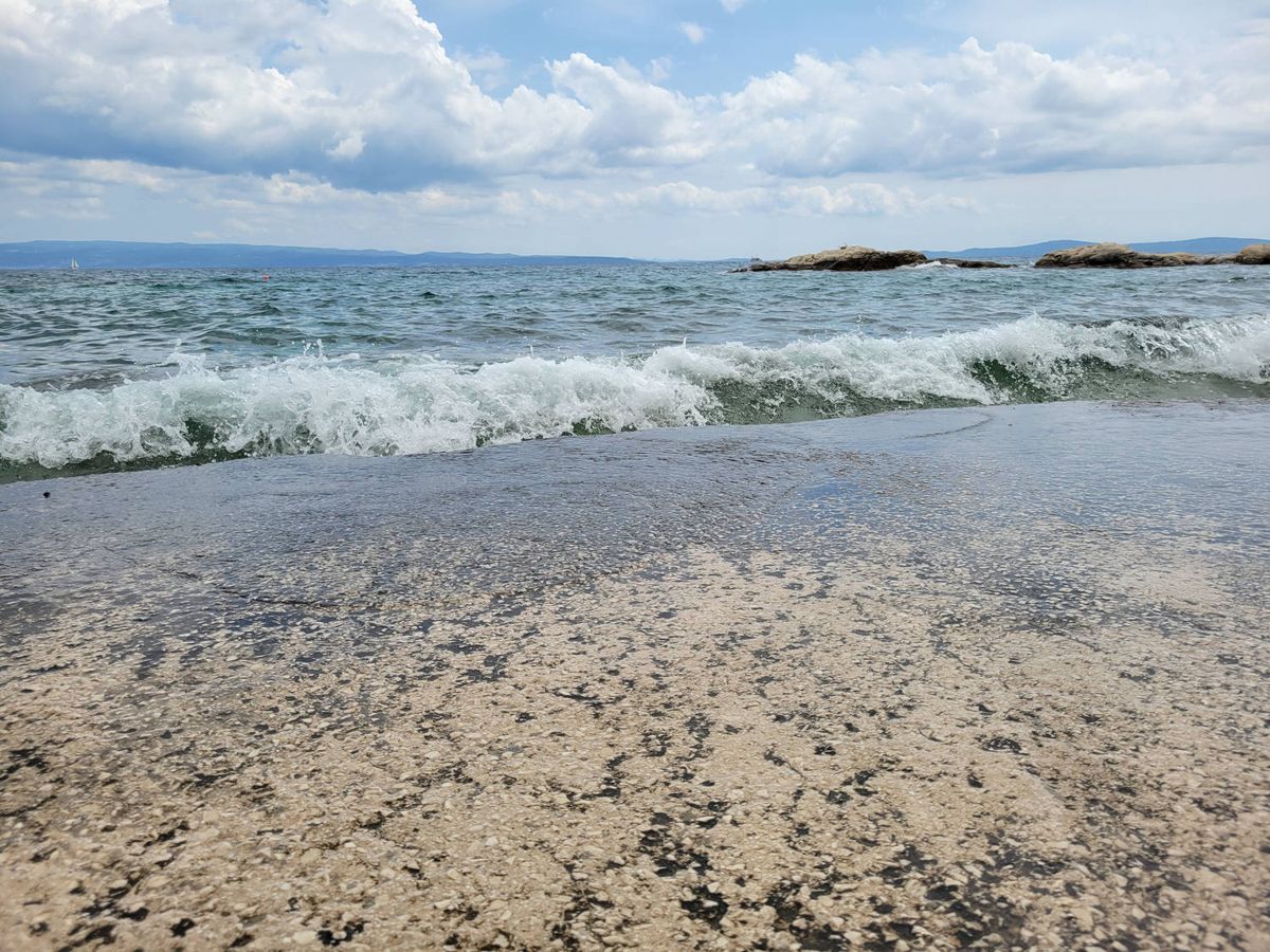 Waves starting to wash over the stone