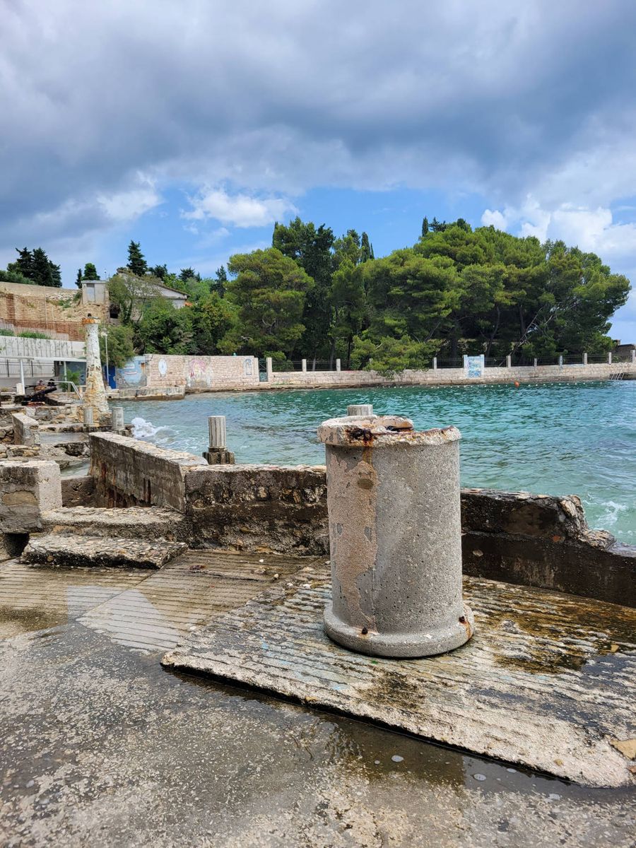 An old column at the shore