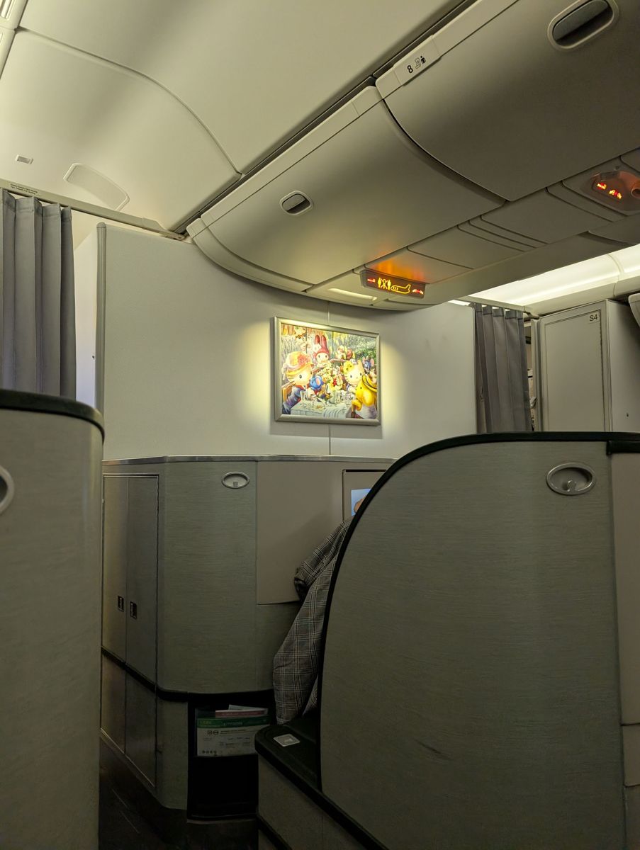 Sanrio art on the bulkhead