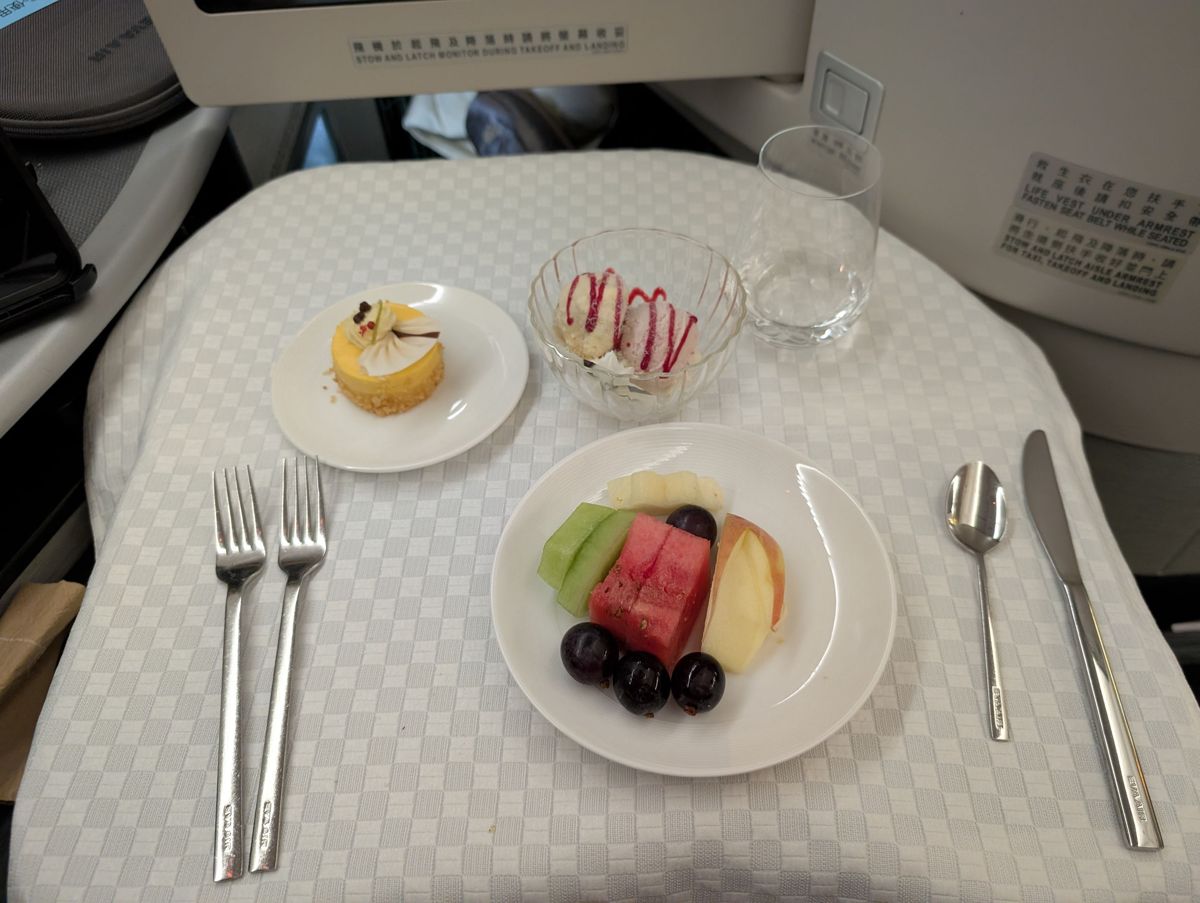 Cheesecake from the cart, ice cream and fruit
